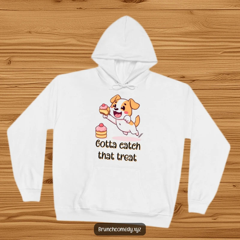 Funny and determined dog character, bravely leaping for a pastry, featured on a warm hoodie.