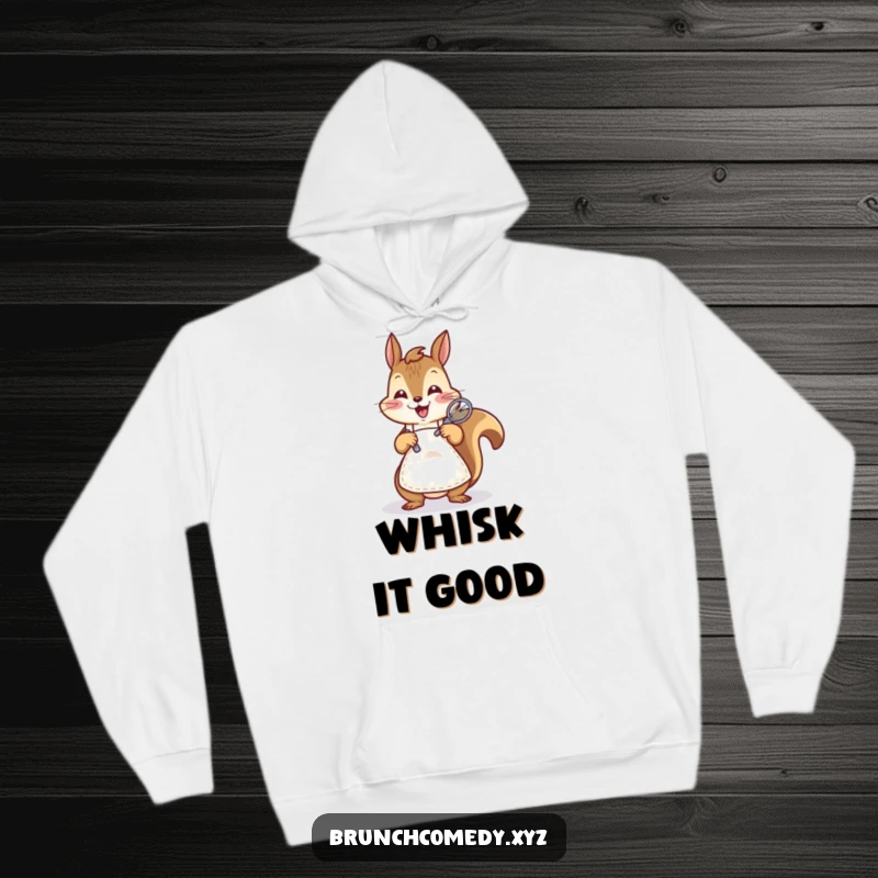 Funny squirrel enthusiastically whisking batter on a hoodie, making it a cozy baking essential.